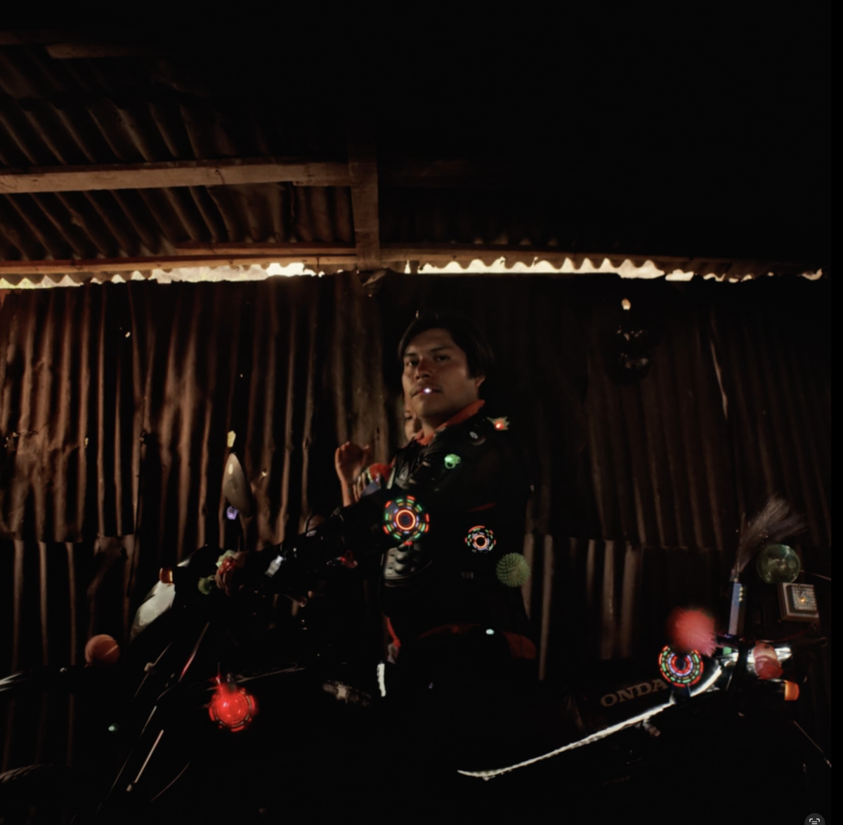 Motorcyclist's happiness wont fit into his suit